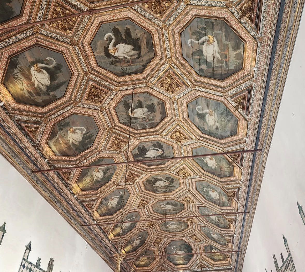 Coffered ceiling painted with swans in Sintra National Palace hall
